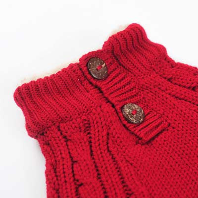 Red dog sweater close-up: ribbed knit collar with two button snaps
