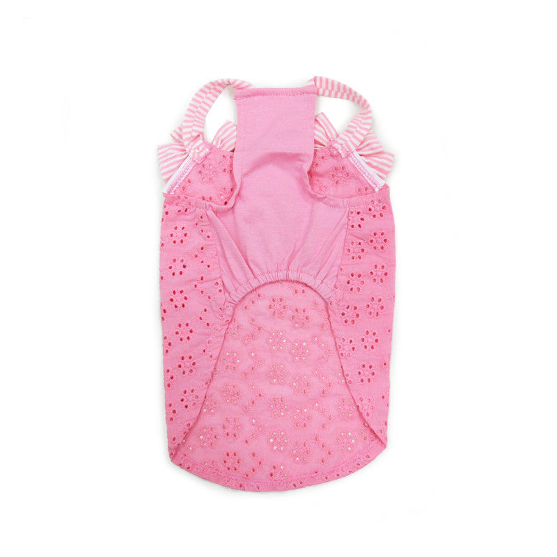 Pink eyelet dog tank with bow shoulder straps and open back silhouette