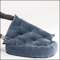 Donut dog bed with padded bolsters and quilted top, blue