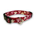 Heart and flower pattern dog collar with red fabric, black strap, and metal buckle ring