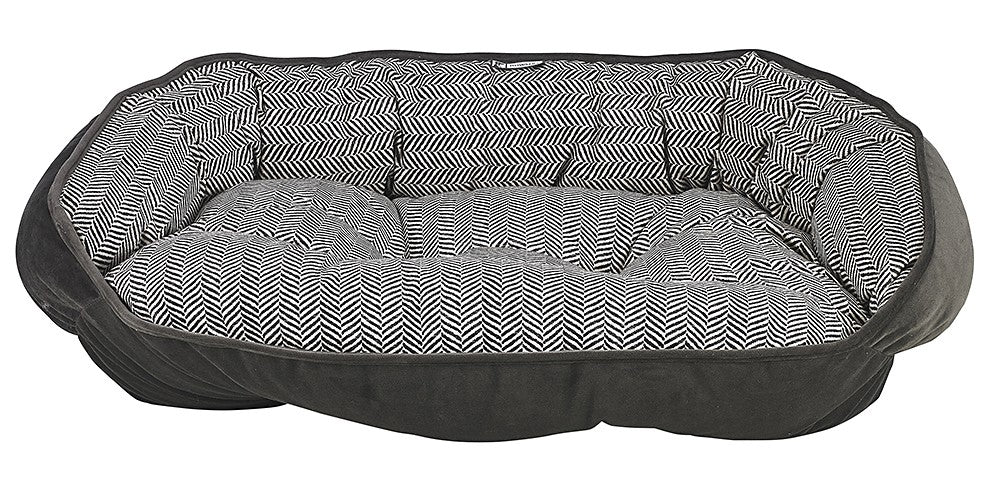 Dark gray plush crescent dog bed with herringbone side panels and flat top cushion