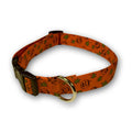 Orange jack-o-lantern and leaf dog collar with brown buckle and gold D-ring