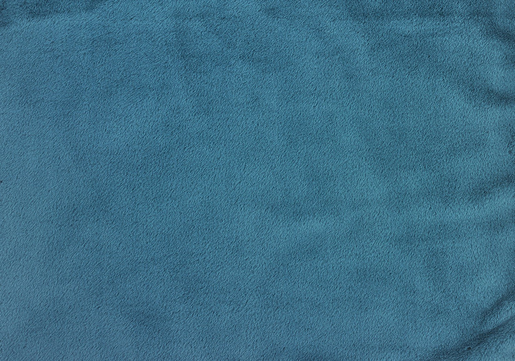 Blue soft fabric close-up with textured suede-like nap