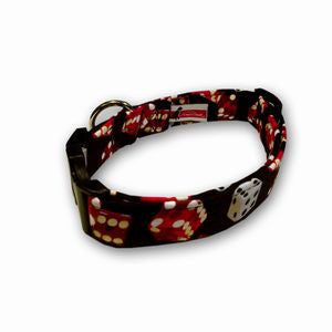 Black dog collar with red dice pattern, adjustable strap and metal leash ring