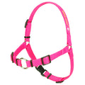 Pink dog harness with metal D-ring and adjustable straps, front view