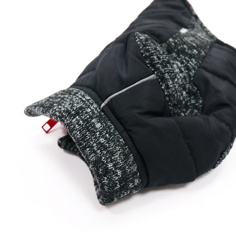Black padded dog coat with gray knit cuffs and padded collar