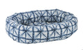 Shibori microvelvet donut dog bed, blue starburst tie-dye, round cushioned bolster