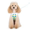 Dog polo-style harness with blue and yellow striped fabric, front snap closure