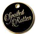 Round black dog ID tag with gold “Spoiled Rotten” script and top hanging hole