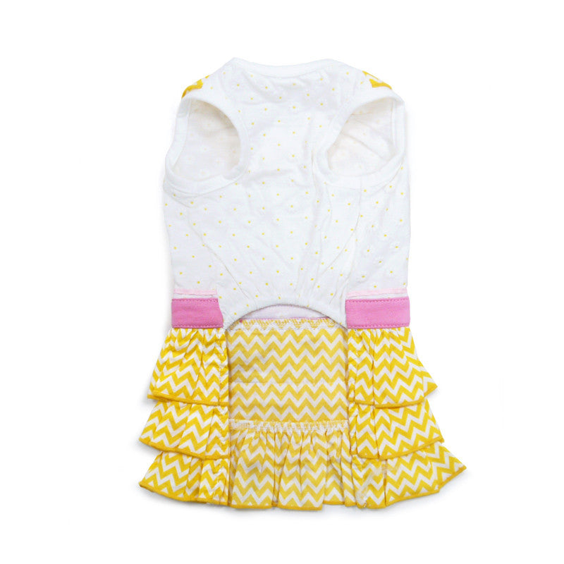 Back view dog dress: white bodice with small dot print, yellow chevron skirt, pink trim