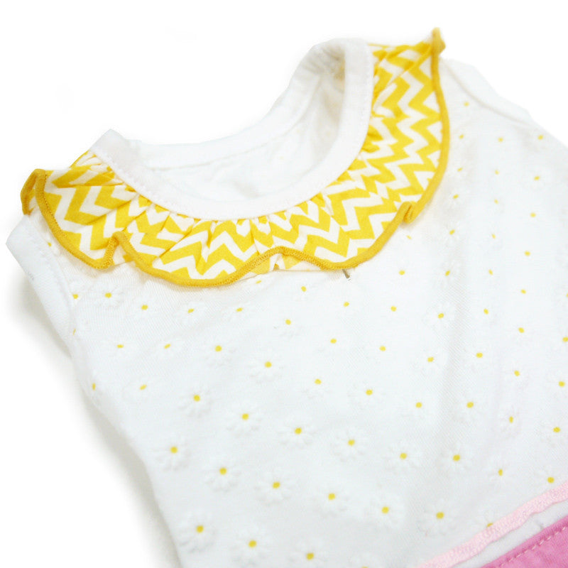 Dog dress neckline detail: white with tiny dot print, yellow chevron ruffle collar