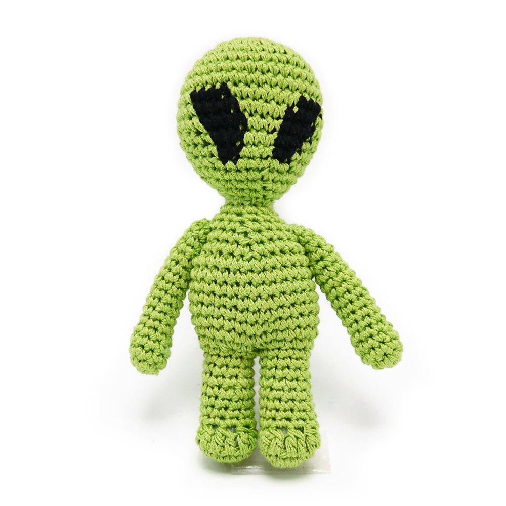 Crocheted green alien dog toy with black eyes, standing full-body design