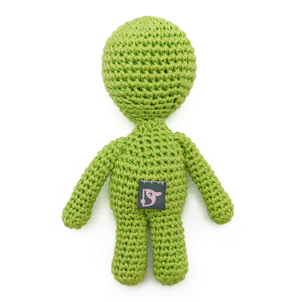 Crocheted green alien dog toy with black eyes and back tag patch