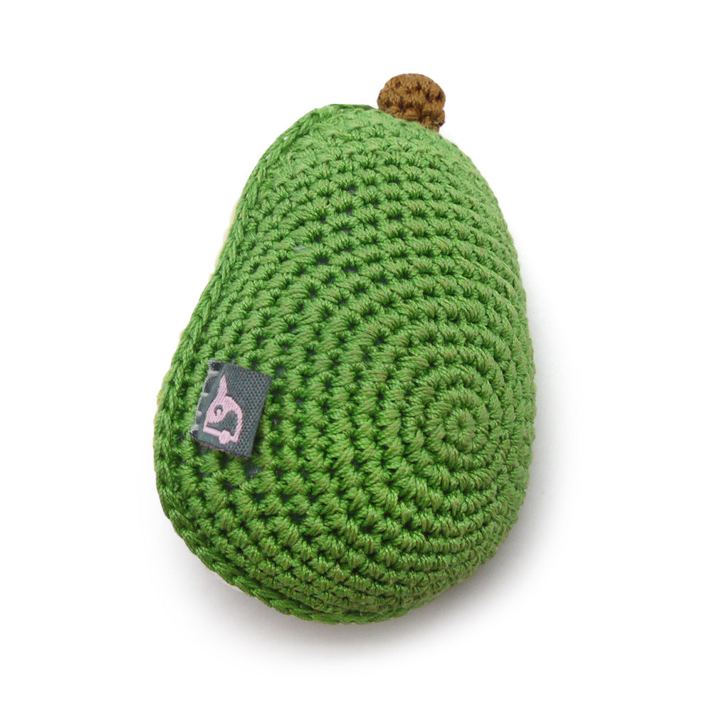 Crochet avocado dog toy with squeaker, bright green knit and brown tip detail