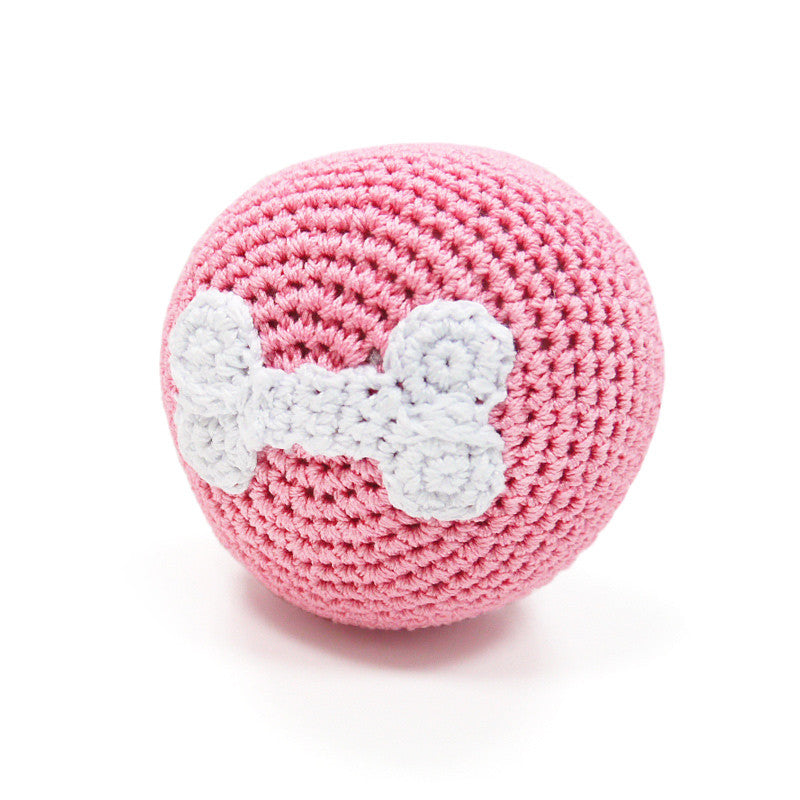 Pink crochet dog toy ball with white bone detail