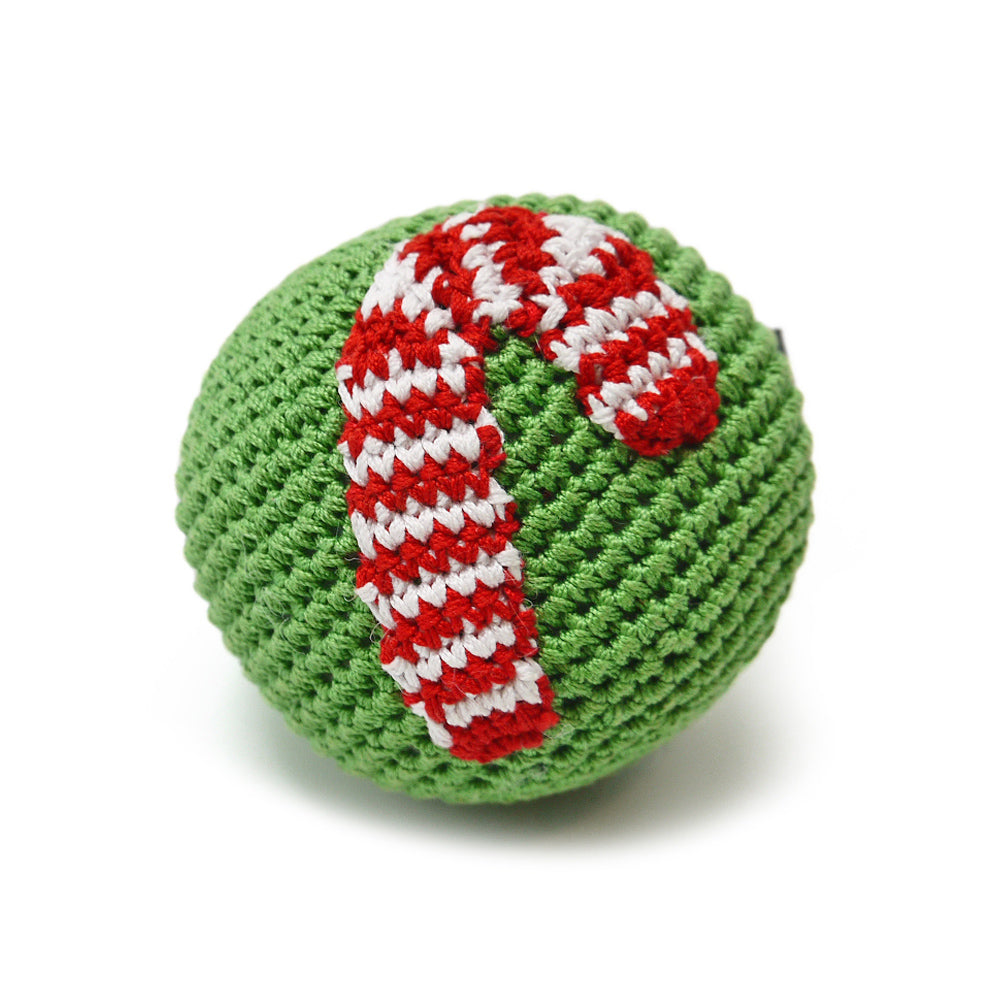Green crochet dog toy ball with red and white candy-cane stripe wraps
