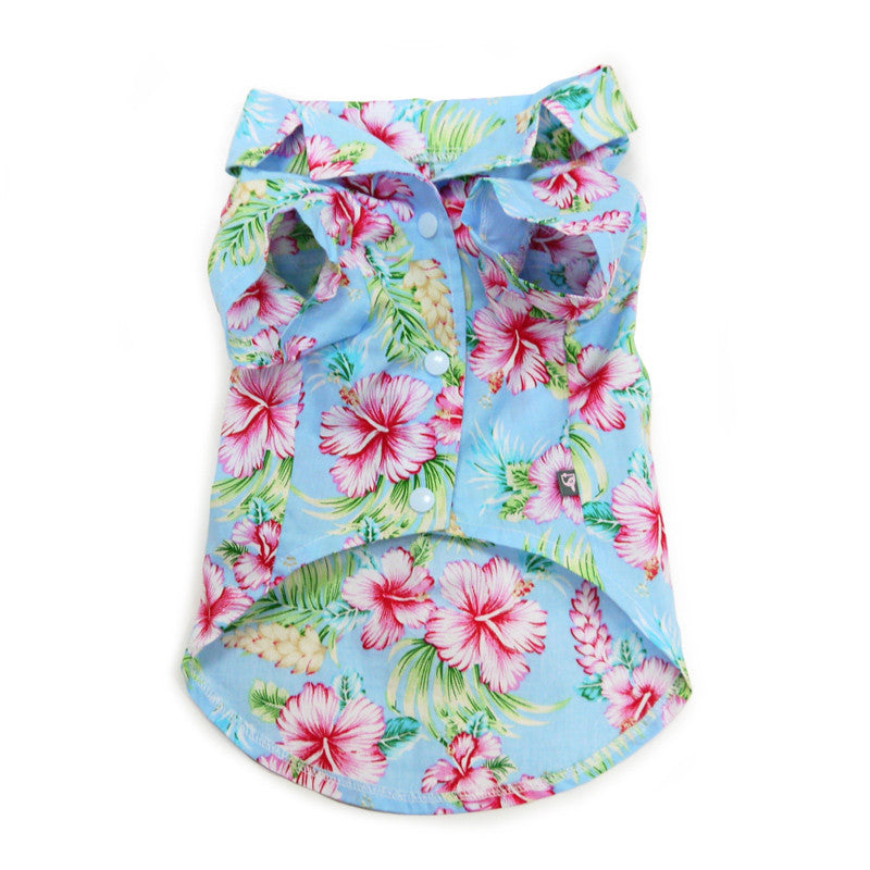 Light blue dog shirt with pink hibiscus and green leaf print, collared