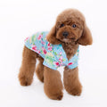 Blue dog shirt with tropical floral print and short sleeves