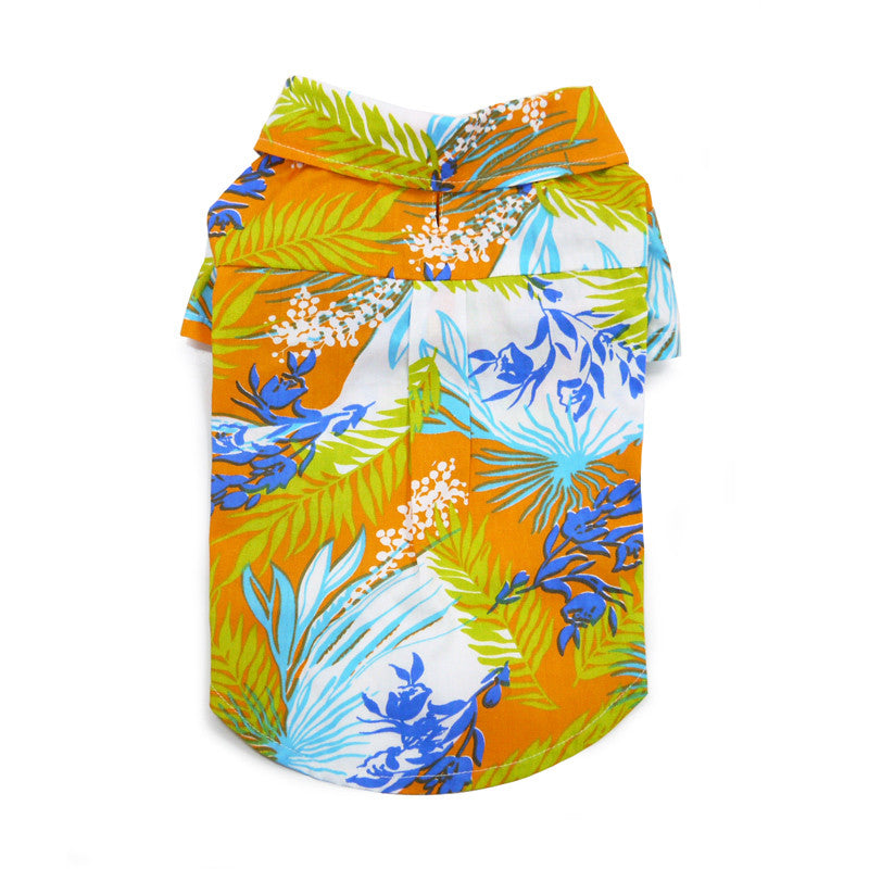Orange tropical dog shirt, back view, blue and green foliage with white dot details