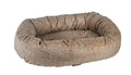 Wheat donut dog bed with ribbed beige-brown fabric and raised bolstered edge