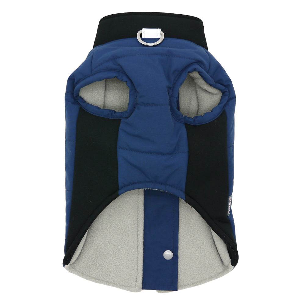 Back view of blue dog coat with black side panels, gray fleece hem, and top D-ring.