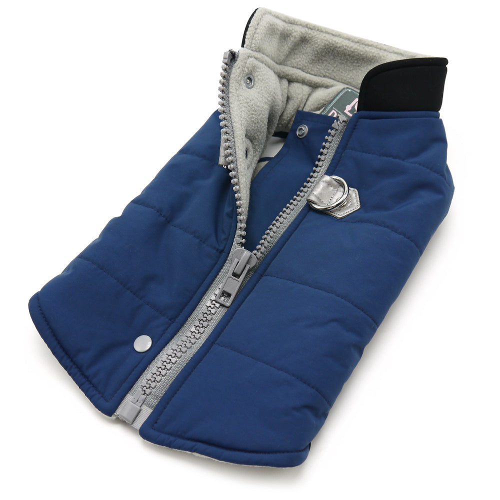 Blue dog puffer coat with gray fleece lining; front zipper and silver zipper pull shown.