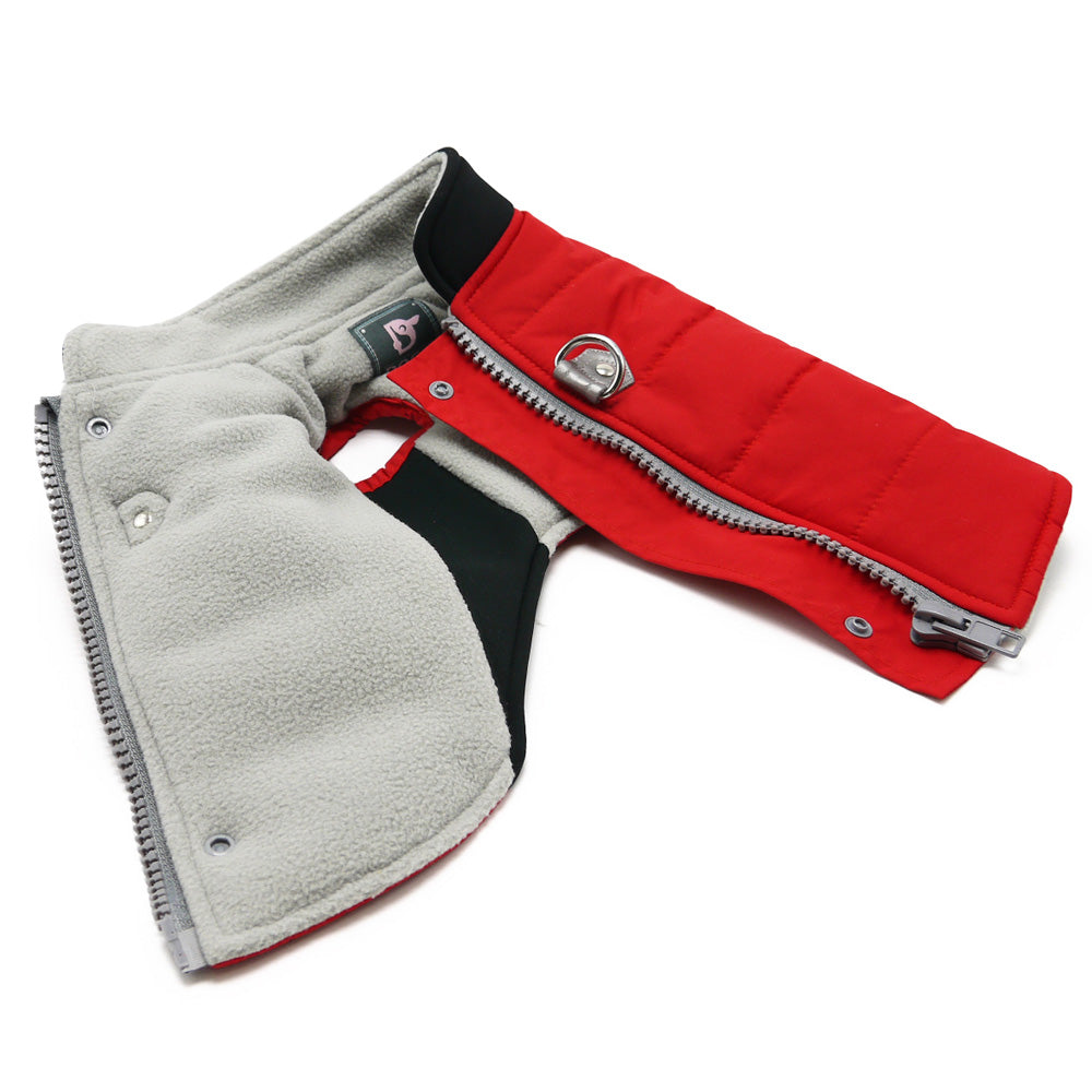 Red and black dog coat with gray fleece collar lining and zipper front, side view