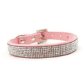 Pink rhinestone dog collar with silver sparkle band and metal buckle, adjustable strap