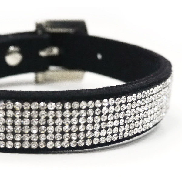 Black bling dog collar with dense rhinestone band along one side