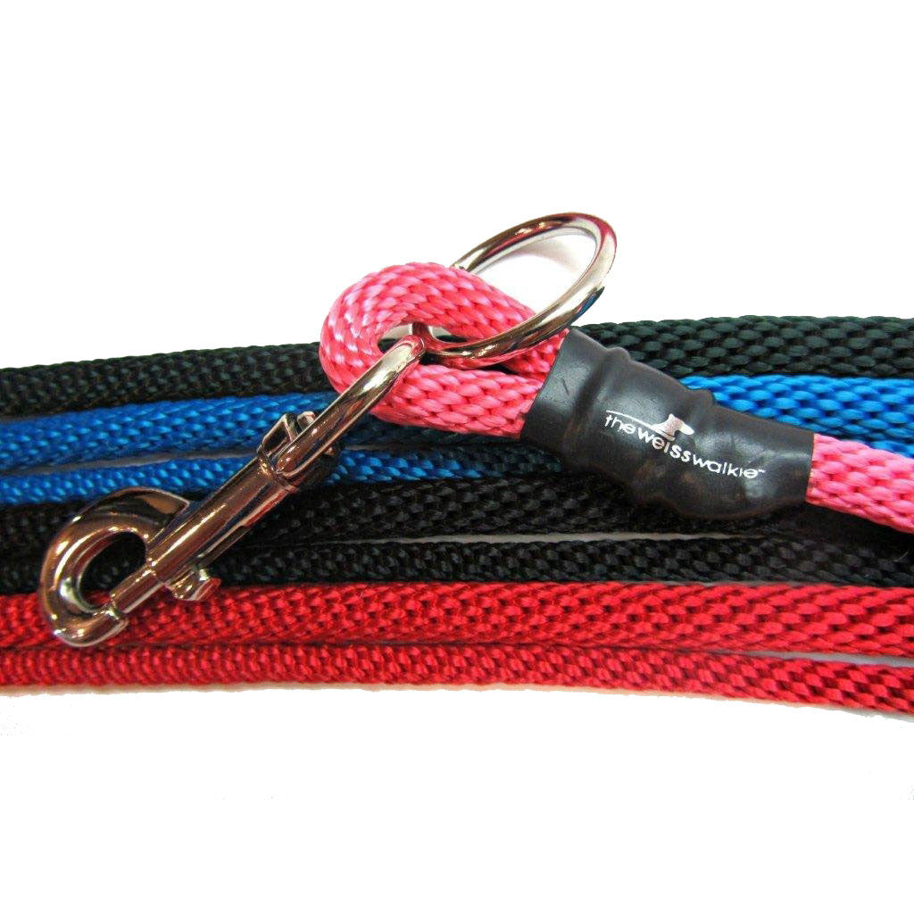 Braided dog training leashes in black, red, and pink with metal clips and rings