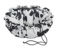 Wrangler round cow-print dog bed with gathered ruffle edge and drawstring ties